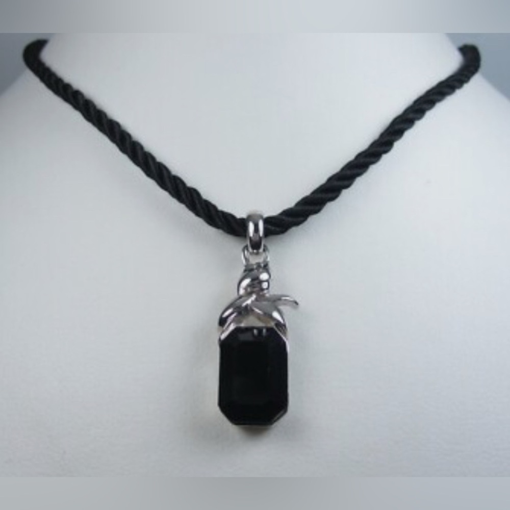 Nina Ricci Rhodium Plated
Pendant with Swarovski Crystals
16-18" Length